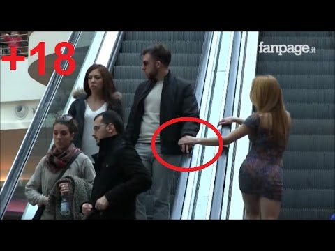 تعرف على ما يفعله الناس عندما يلمسهم شخص على السلم الكهربائي